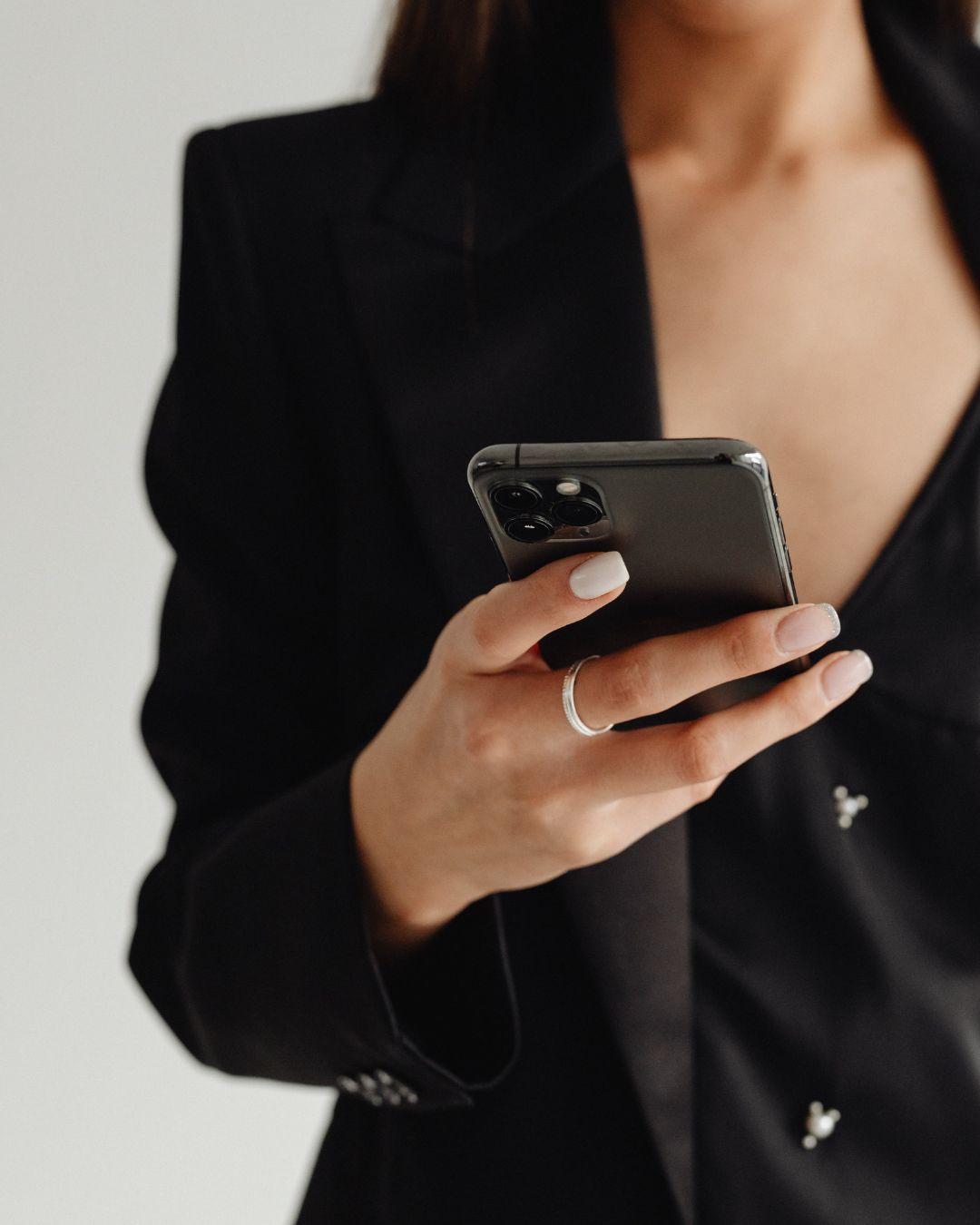 woman holding phone